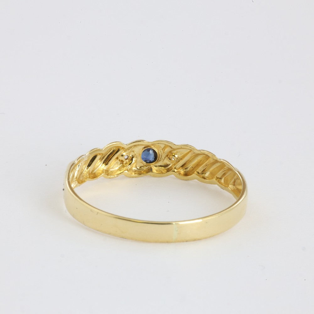 Bague en Or jaune 18k avec Saphir et Zirconiums