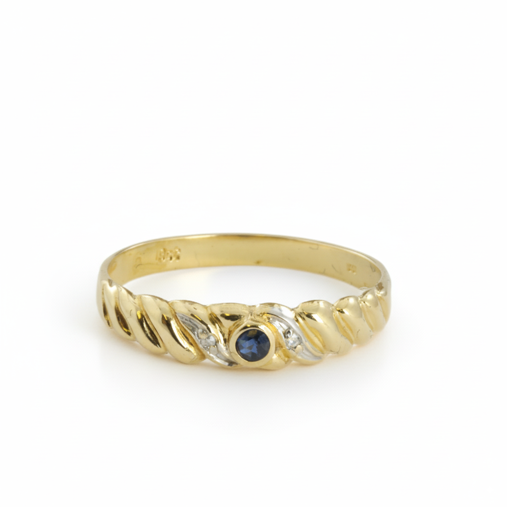 Bague en Or jaune 18k avec Saphir et Zirconiums