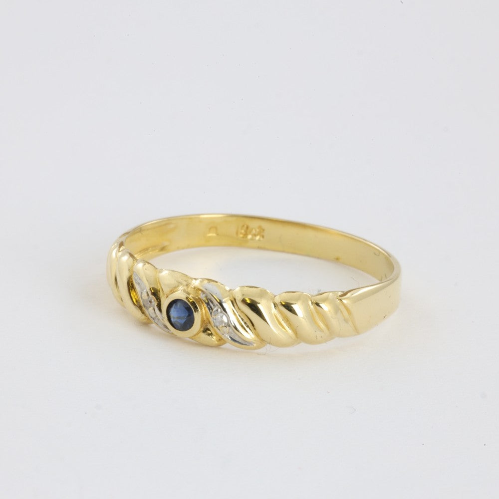 Bague en Or jaune 18k avec Saphir et Zirconiums