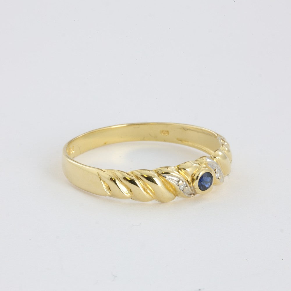Bague en Or jaune 18k avec Saphir et Zirconiums
