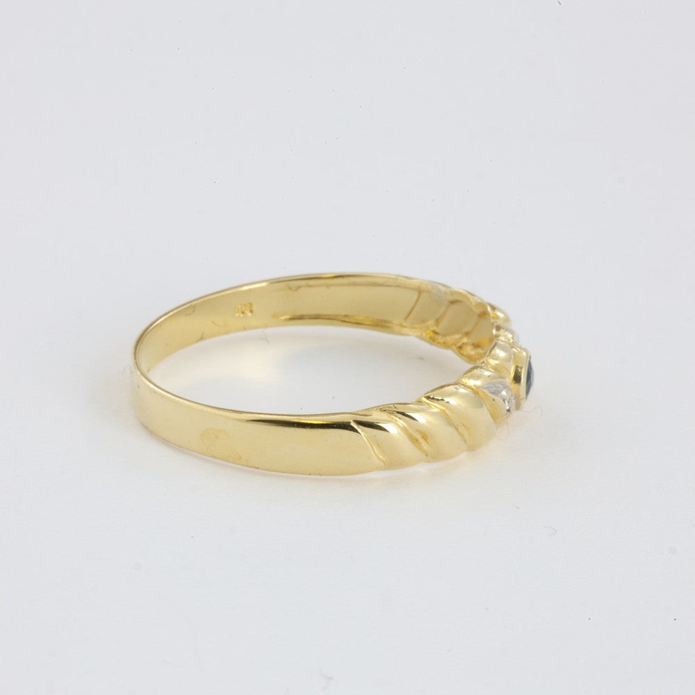 Bague en Or jaune 18k avec Saphir et Zirconiums