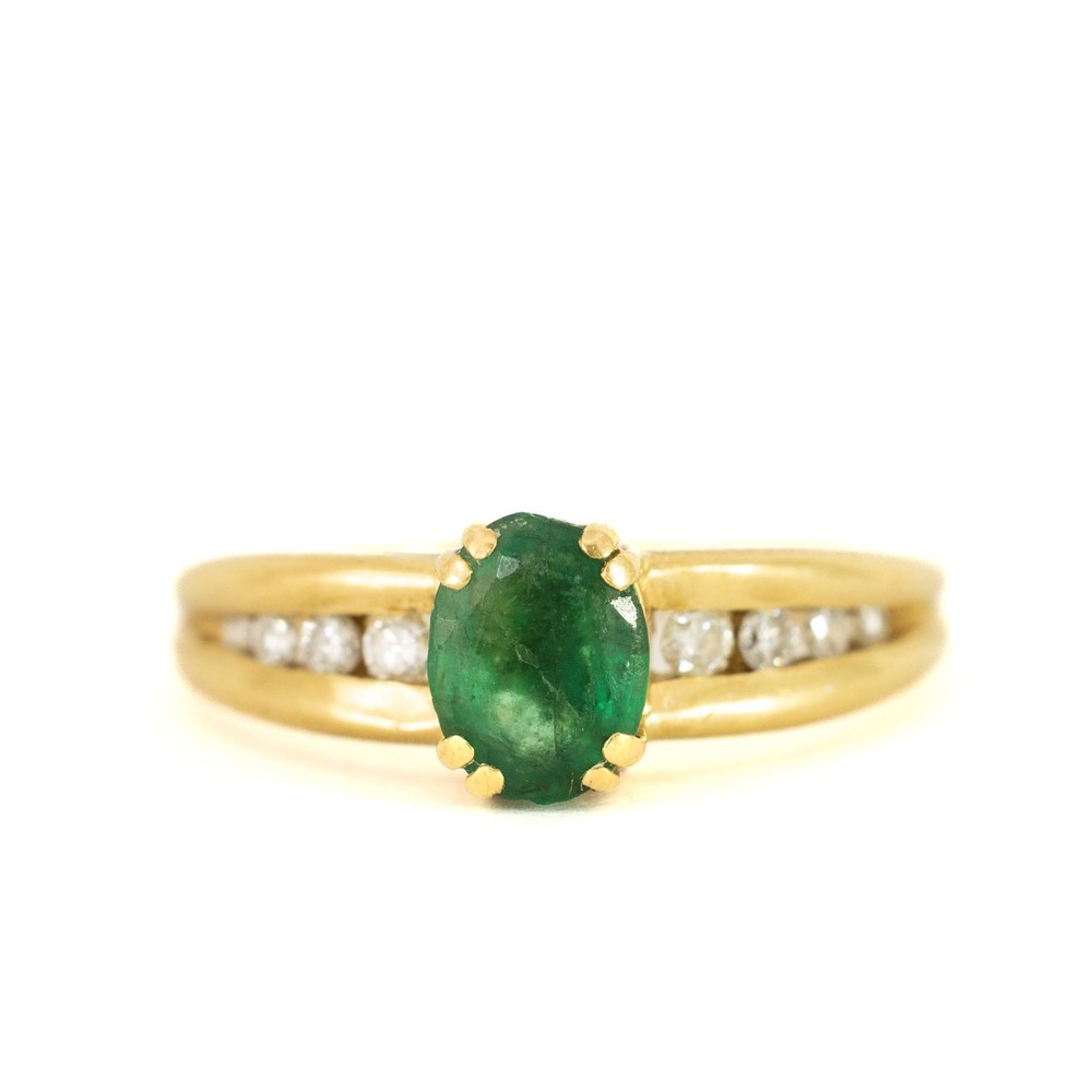 Bague en or jaune 18k avec Emeraude