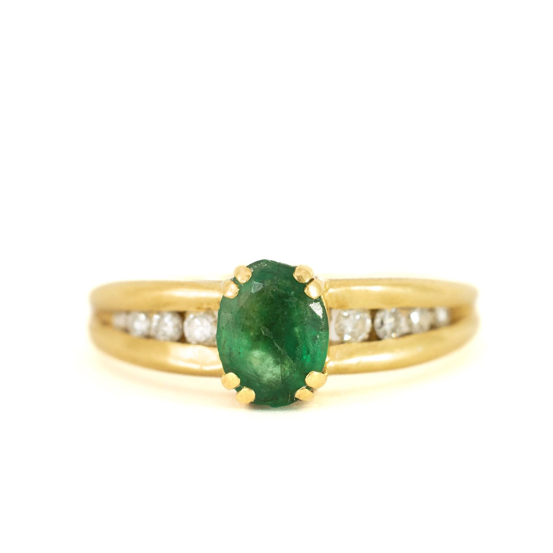 Bague en or jaune 18k avec Emeraude