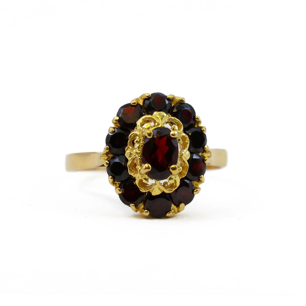 Bague en or jaune 18k avec Grenats
