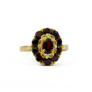 Bague en or jaune 18k avec Grenats