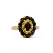 Bague en or jaune 18k avec Grenats