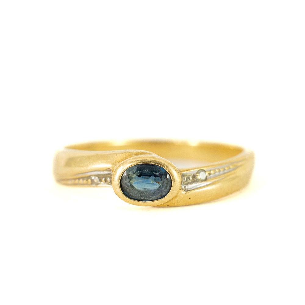Bague en or jaune 18k avec Saphir