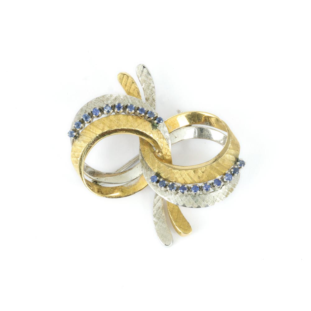 Broche deux Ors 18k avec Saphir Synthétique