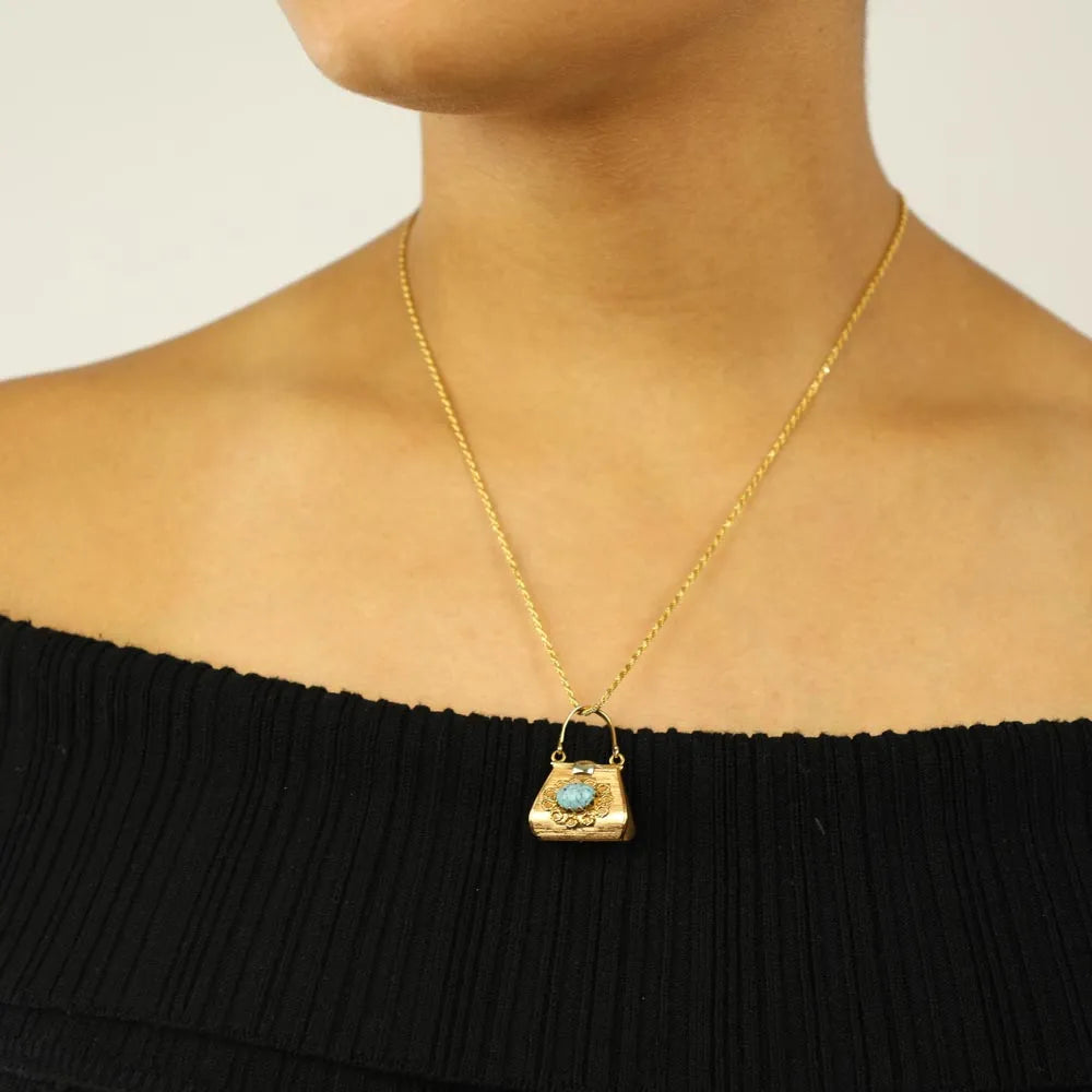 18k yellow gold pendant - "Handbag" motif with turquoise
